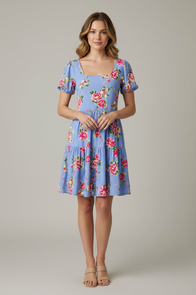 women wearing blue floral mini dress