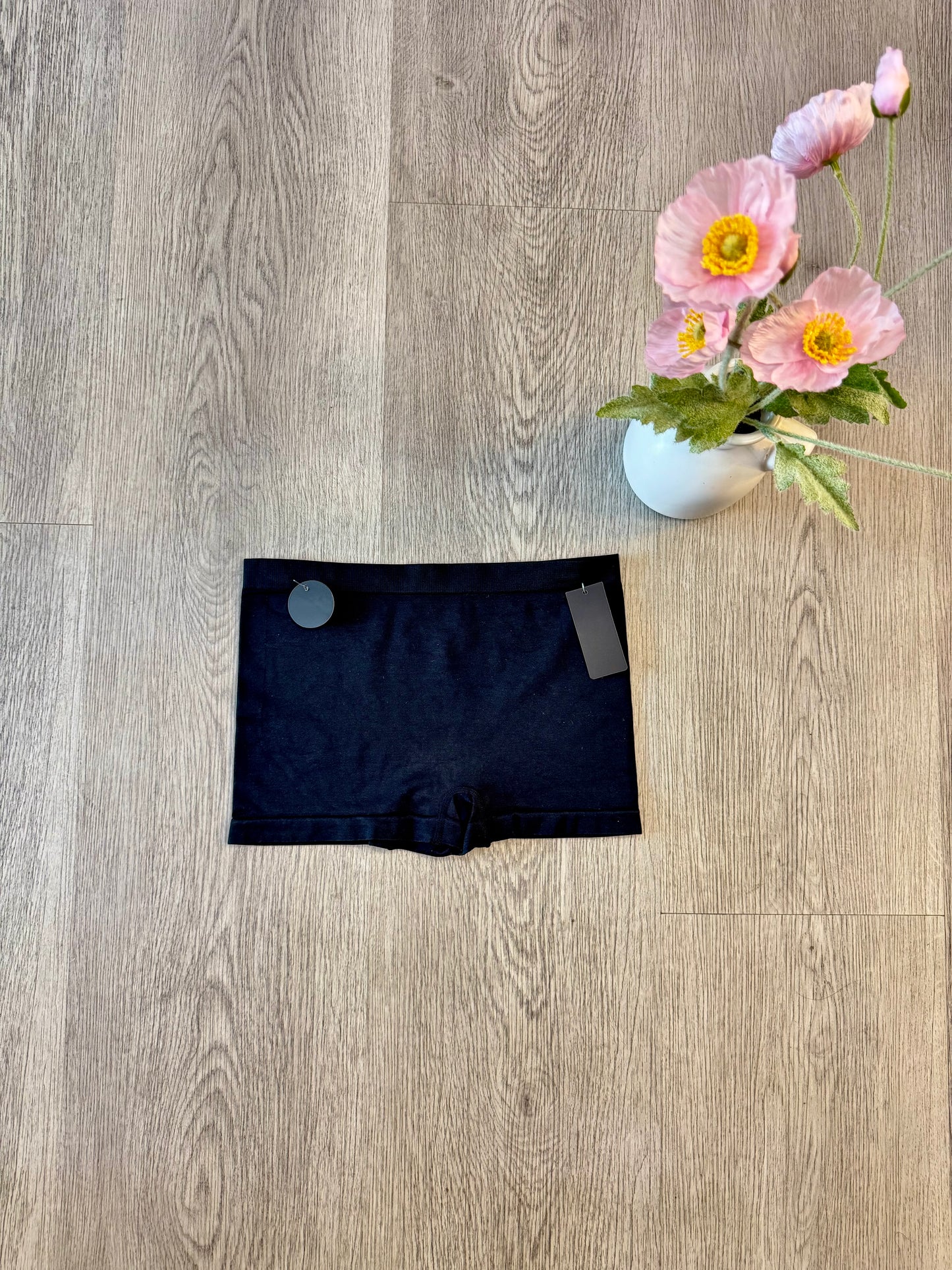 Black seamless soft boy shorts with new improved fabric. Shop Lily's Fashion Boutique.