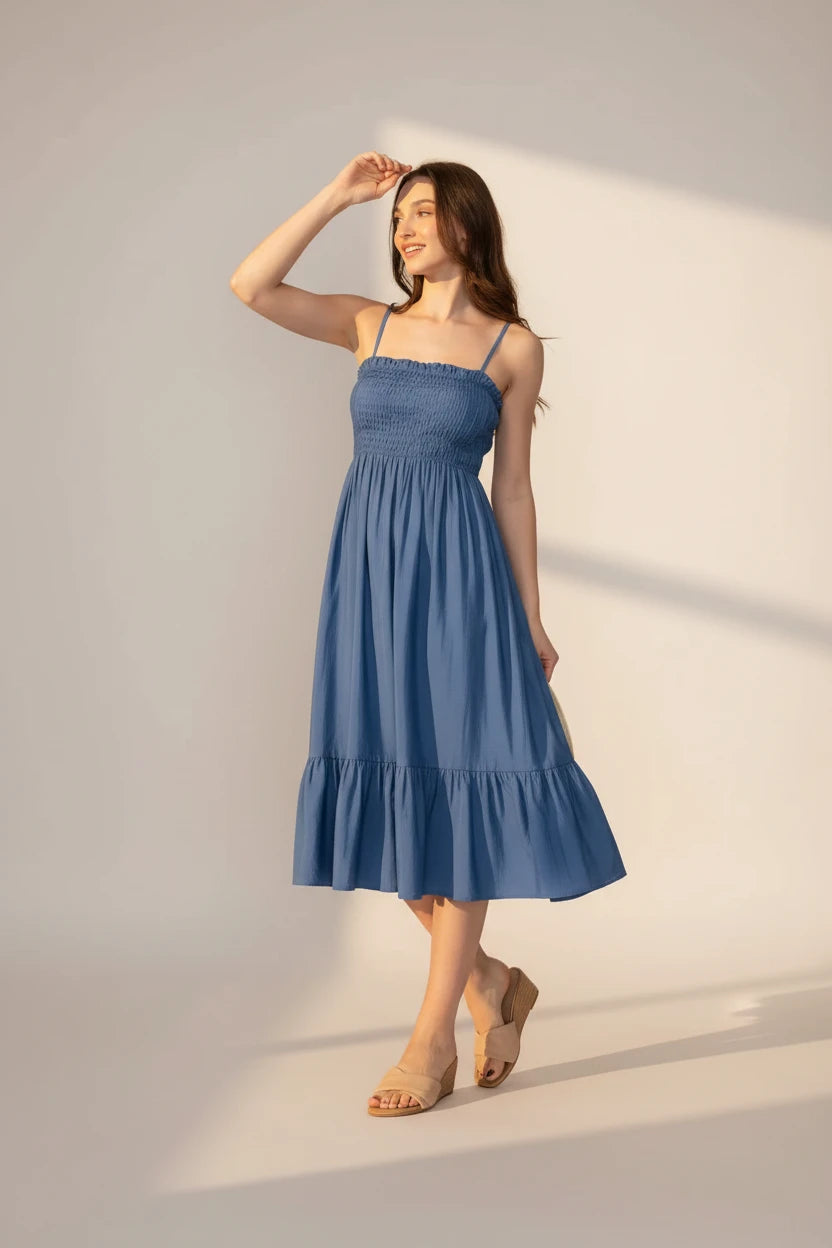 Blue spaghetti strap tiered Mido dress for women, flowy lightweight summer dress, casual elegant outfit from Lily's Fashion Boutique.