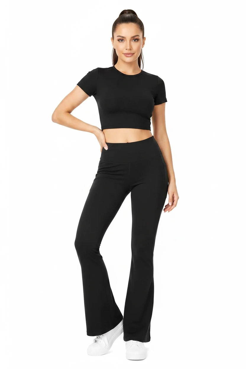 Women wearing Natalie black high-waisted flare leggings with side cellphone pockets.
