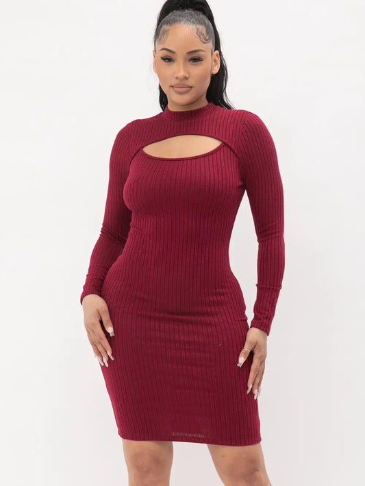 Model wearing the Adeline Ribbed Dress in burgundy, a long-sleeve ribbed bodycon dress with a stylish front cut out.