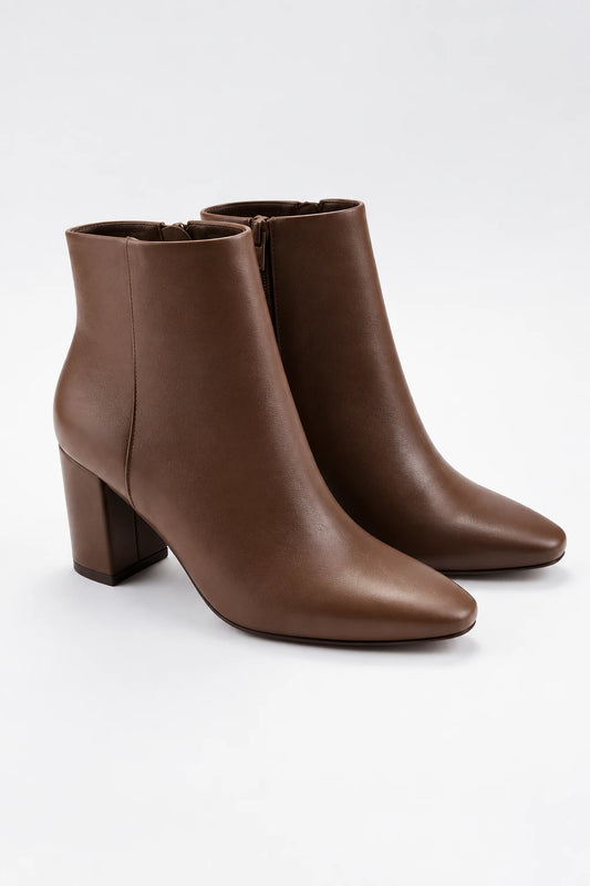 Vanessa brown block heel ankle booties with a sleek pointed-square toe and side zipper.