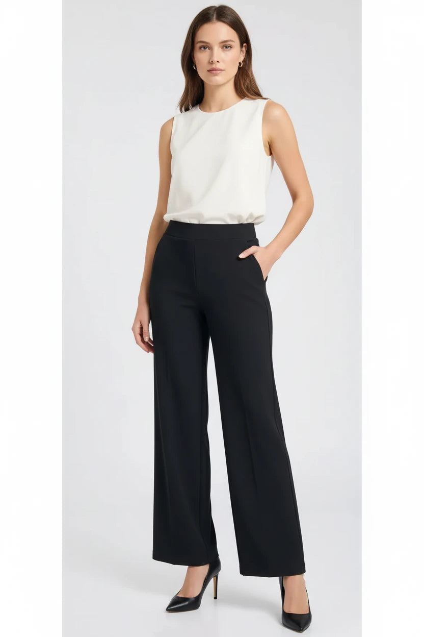 Women modeling black high- waisted wide-leg pants with side pockets and relaxed fit.