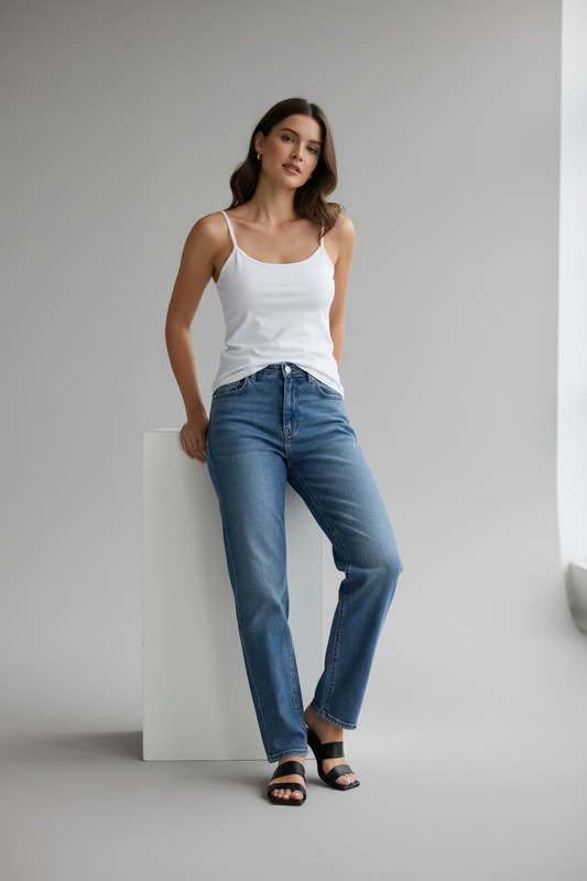 model wearing white tank top with jeans. Local boutique Paramount, CA.