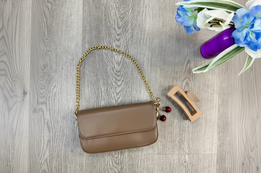 Sienna Chain Shoulder Bag in taupe with gold chain strap. Shop local paramoun, CA boutique.