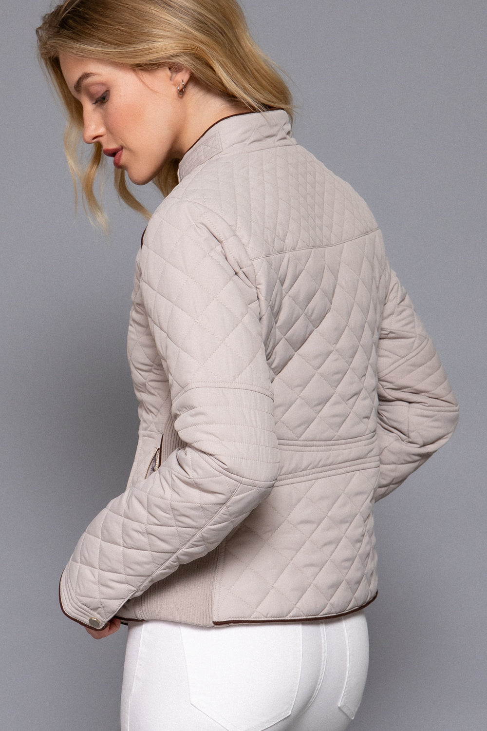 back and side view of the Hailey beige quilted jacket showing the quilted pattern, tailored shape and hip-length design,