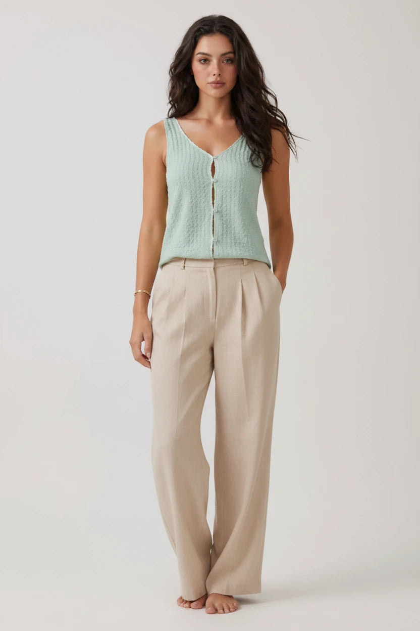 women's sage green textured sleeveless tank top with a V-neckline and button-front detail.